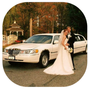 Newlyweds in Front of Limo 